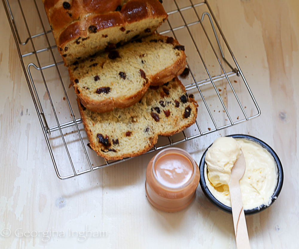 Sliced Cornish saffron loaf served with clotted cream and curd